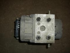 Kuva 1: abs hydraulipumppu, Nissan Almera