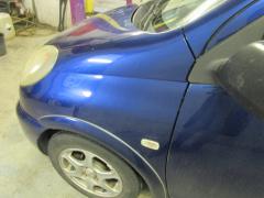 Kuva 1: lokasuoja etu vasen, Toyota Yaris Verso 1.3 -99