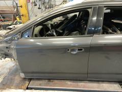 Kuva 1: vasen etuovi, Ford Mondeo STW 1,8TDCi