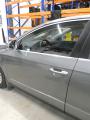 vasen etuovi  Volkswagen Passat (3C2) 2.0 FSI 2006 150hv