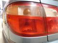 Kuva 2: takavalo vasen, Nissan Almera (N16) 1.5 2002 90hv