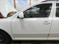 vasen etuovi  Skoda Octavia Combi (1Z5) 2.0 TDI 16V 2011 140hv 