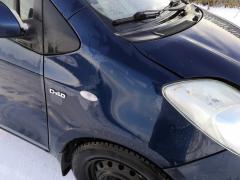 Kuva 1: lokasuoja etu oikea, Toyota Yaris 1.4D4D -08