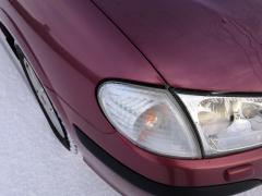 Kuva 1: vilkku etu oikea, Nissan Almera 1.5 HB 3ov. -02