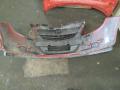 puskuri etu  Opel Corsa 1.2 3D -07 hatchback