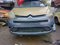 puskuri etu  Citroen C4 Grand Picasso -06 