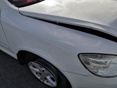 Kuva 1: lokasuoja etu oikea, Skoda Octavia 1.6 TDI farm. -11