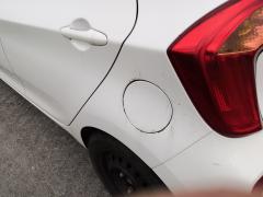 Kuva 1: polttoaineen tyttaukon kansi, Kia Picanto 1.0 -13