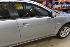 Kuva 1: oikea etuovi, Mitsubishi Lancer VIII 2008 1.5