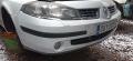 puskuri etu  Renault Laguna farkku valkonen