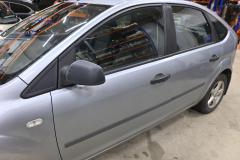 Kuva 1: vasen etuovi, Ford Focus 1.6 Bensa 2005