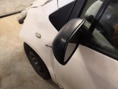 Kuva 1: sivupeili shk vasen, Toyota Yaris 1.4D4D -09