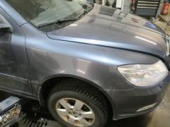 Kuva 1: lokasuoja etu oikea, Skoda Octavia 1.8 TSI -09