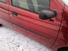 Kuva 1: oikea etuovi, Fiat Punto 1.2 5ov. -06