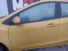 Kuva 1: vasen etuovi, Mazda 2 1.4 MZR-CD