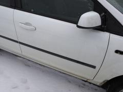 Kuva 1: oikea etuovi, Ford Focus 1.6 TDCi HB -07