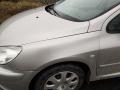 lokasuoja etu  vasen  Peugeot 307 1.6 farm. -05 