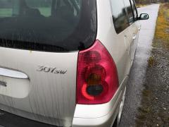 Kuva 1: takavalo oikea, Peugeot 307 1.6 farm. -05