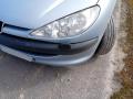 puskuri etu  Peugeot 206 1.4i 3ov. -04 