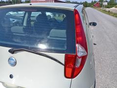 Kuva 1: takavalo oikea, Fiat Punto 1.2 3ov. -07