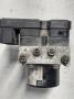 Kuva 4: abs hydraulikoneisto, Volkswagen Caddy 04-10