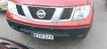 puskuri etu  Nissan Navara 4D douple cap 