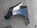 lokasuoja etu  vasen  Honda Jazz 1.4
