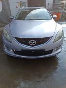 Kuva 1: konepelti, Mazda 6 StW 2.0 MZR-CD