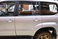 vasen takaovi  Toyota Landcruiser J120 2004 