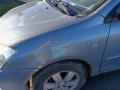 lokasuoja etu  vasen  Toyota Corolla 1.6VVT-i HB 5ov. -03 