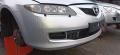 puskuri etu  Mazda 6 wagon 2007
