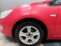 lokasuoja etu  vasen Opel Astra J 1.4i Turbo Farm
