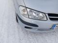 puskuri etu  Nissan Almera (N16) 1.8 sedan -01