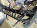 puskuri etu GG3E50031 Mazda 626 2000-2002