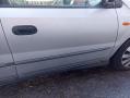 oikea etuovi alkuperäinen Nissan Almera Tino 1.8