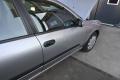 oikea etuovi  Nissan Almera (N16) 2005 1.5 bensa (Sedan)