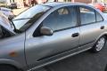 vasen etuovi  Nissan Almera (N16) 2005 1.5 bensa (Sedan)
