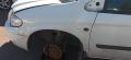 lokasuoja etu  vasen Chrysler Voyager 2006
