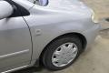 lokasuoja etu oikea NMT  Toyota Corolla 2003 E120 1.6 Bensa Farmari (NMT)