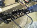puskuri etu B48250031 Mazda 323 87-94