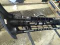 puskuri etu B48250031 Mazda 323 87-94