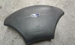 Kuva 1: air-bag kuljettajan turvatyyny, Ford Focus 98-04