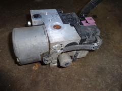 Kuva 1: abs hydraulipumppu, Opel Astra G