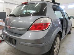 Kuva 1: takapuskuri, Opel Astra H 1.6i 16V 5 HB